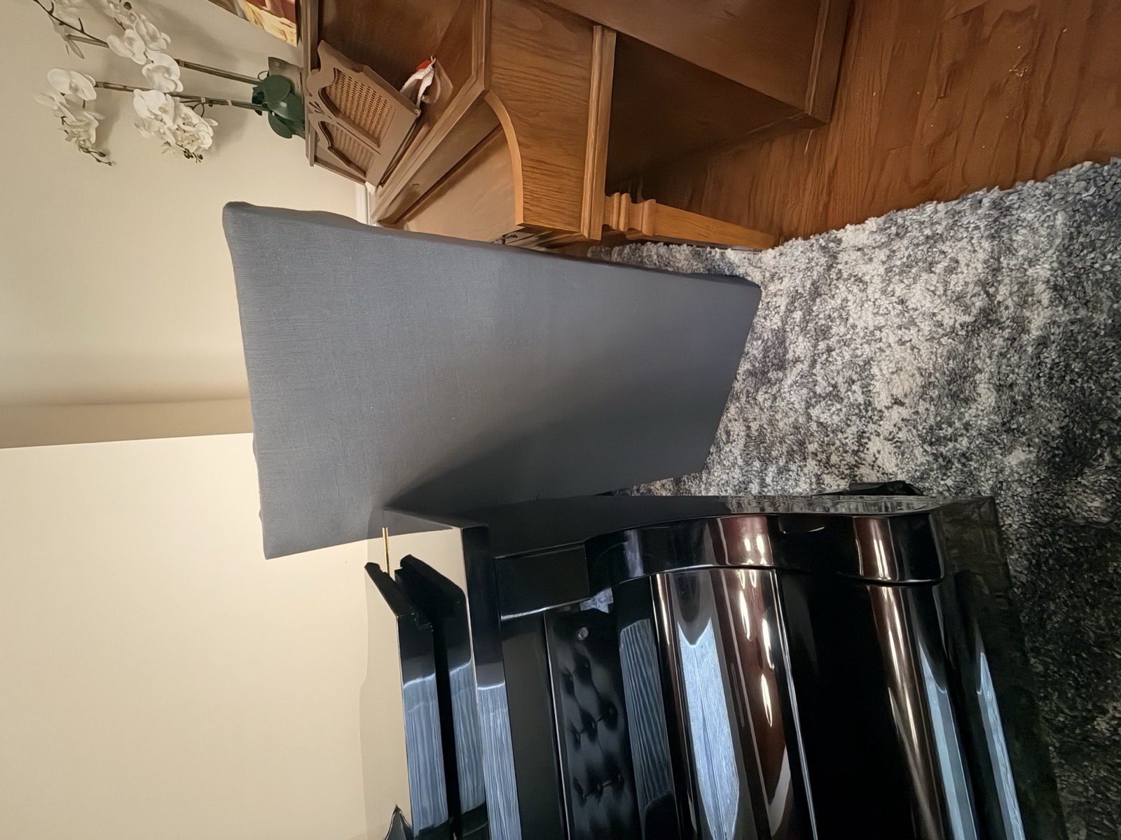 A finished panel, fabric-wrapped